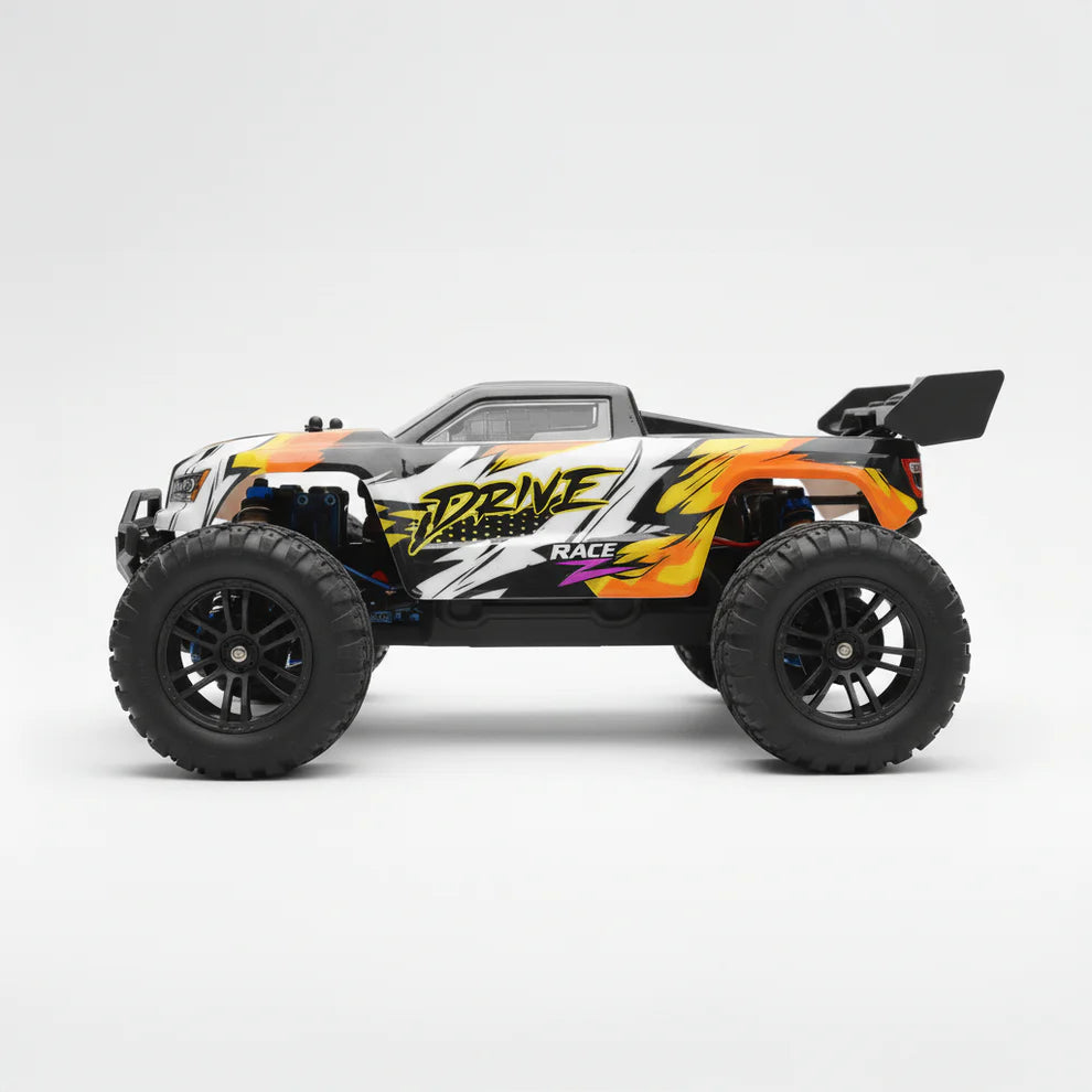 Truggy Impact Vector de trois quarts, aileron et pneus à crampons