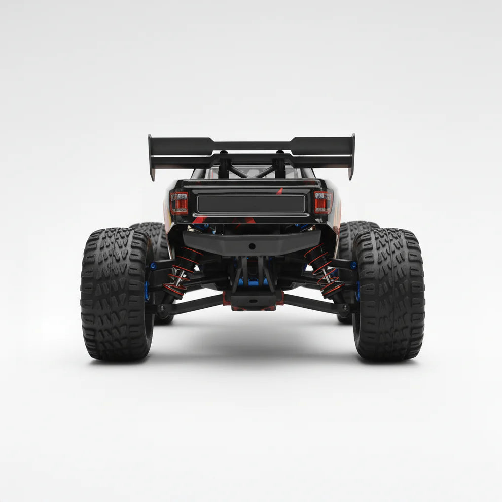 Truggy Impact Vector vu de l’arrière, aileron et quatre amortisseurs à huile