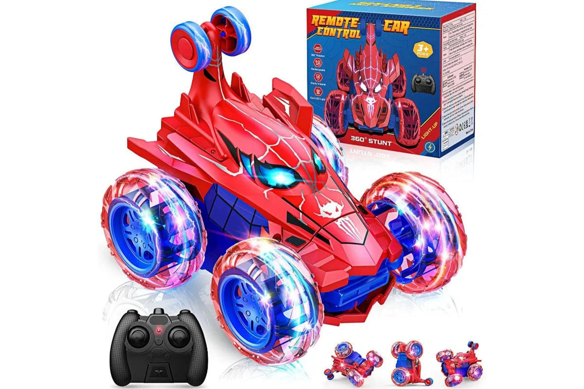 Voiture télécommandée cascadeuse Arachno araignée rouge et bleue devant sa boîte, avec sa manette
